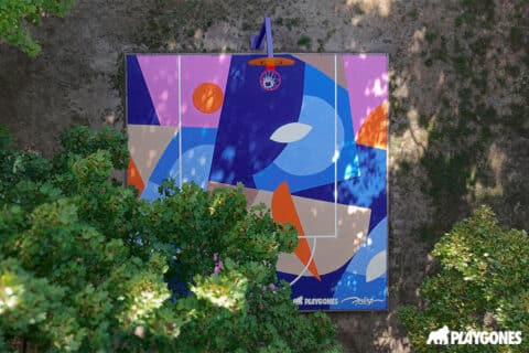Terrain de basket 3x3 rénové au Parc Louis Jouvet à Achères avec fresque colorée signée Stéphane Opéra